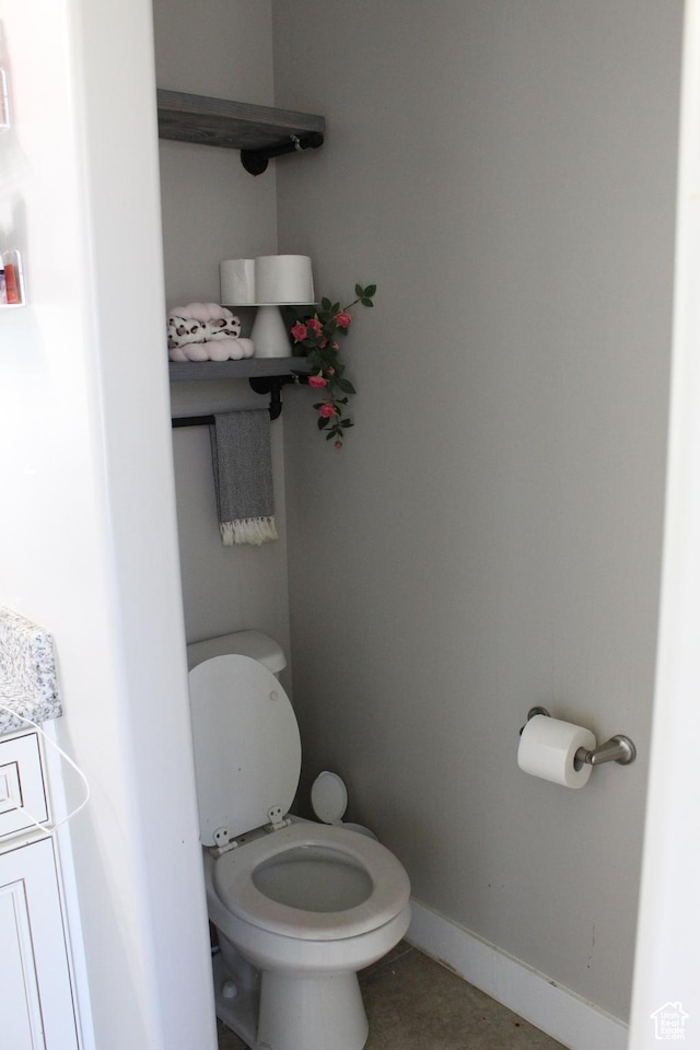 2359 E Prairie Ln, Eagle Mountain, UT 84005 - bathroom featuring toilet and tile patterned flooring