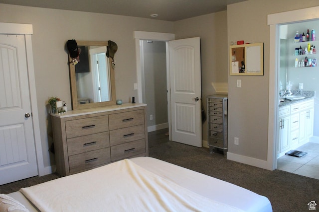 2359 E Prairie Ln, Eagle Mountain, UT 84005 - bedroom with dark carpet and baseboards