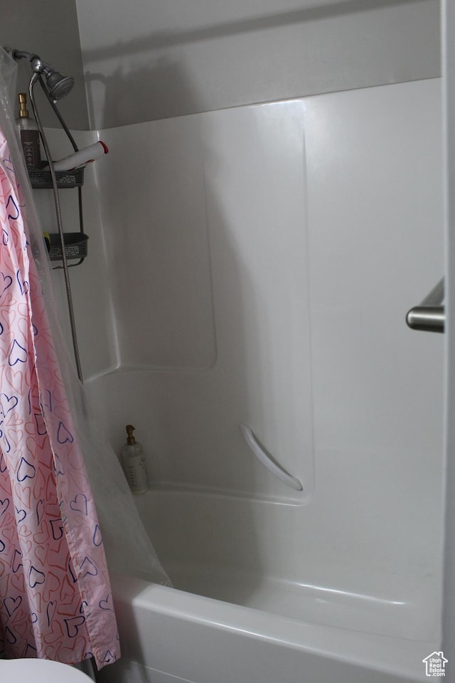 2359 E Prairie Ln, Eagle Mountain, UT 84005 - bathroom featuring shower / tub combo