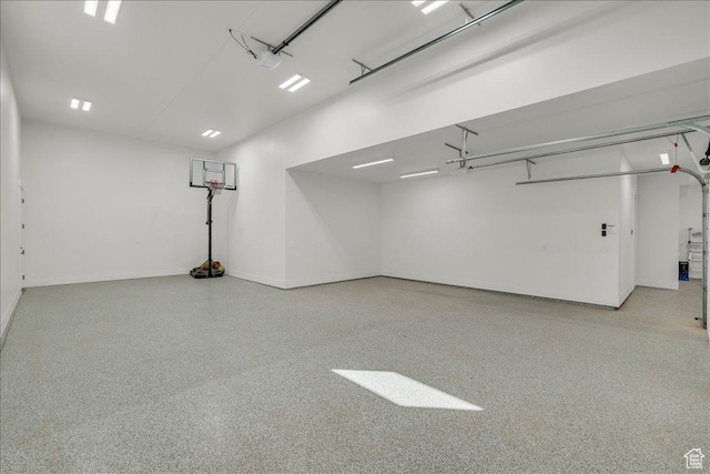 1597 W Belayer Dr, St George, UT 84770 - garage with baseboards and a garage door opener