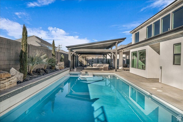1597 W Belayer Dr, St George, UT 84770 - view of swimming pool featuring outdoor lounge area, a fenced backyard, and a patio