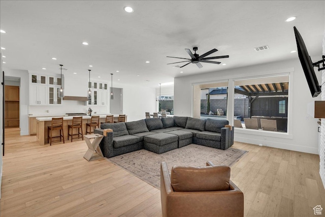 1597 W Belayer Dr, St George, UT 84770 - living room featuring recessed lighting, light wood-type flooring, and ceiling fan
