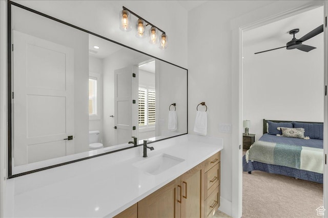 1597 W Belayer Dr, St George, UT 84770 - ensuite bathroom with vanity, a ceiling fan, and recessed lighting