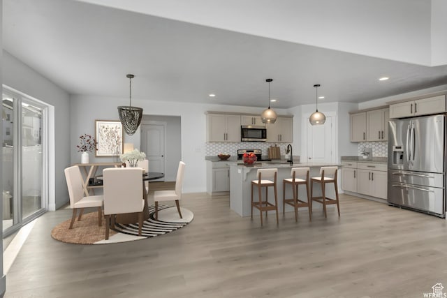 4273 W Watchmen Way, Herriman, UT 84096 - dining area with light wood-type flooring, recessed lighting, and a chandelier
