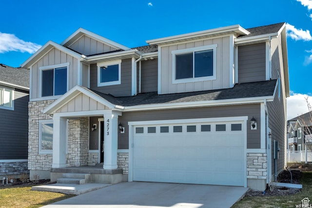 4273 W Watchmen Way, Herriman, UT 84096 - craftsman-style house featuring stone siding, board and batten siding, and a garage