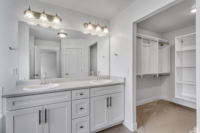 4273 W Watchmen Way, Herriman, UT 84096 - bathroom featuring double vanity and a spacious closet