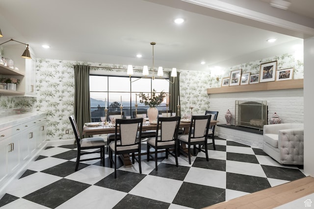 4605 S Ledgemont Dr E, Salt Lake City, UT 84124 - dining space with wallpapered walls, a fireplace, recessed lighting, and a chandelier