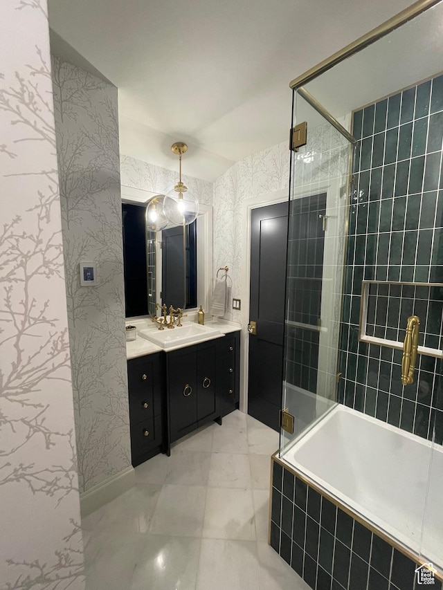 4605 S Ledgemont Dr E, Salt Lake City, UT 84124 - full bath featuring a relaxing tiled tub, vanity, wallpapered walls, tiled shower, and marble finish flooring