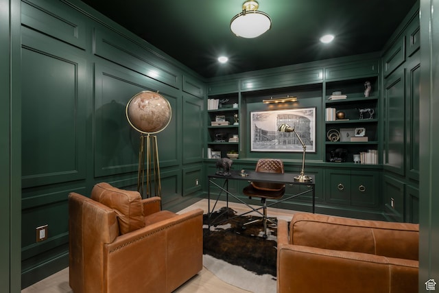 4605 S Ledgemont Dr E, Salt Lake City, UT 84124 - living area with a decorative wall, a desk, built in features, and recessed lighting