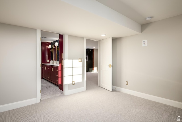 4605 S Ledgemont Dr E, Salt Lake City, UT 84124 - below grade area featuring light carpet and a sink
