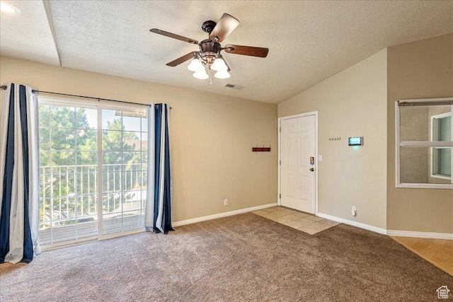 1218 W 1420 N, Orem, UT 84057 - carpeted spare room with a textured ceiling, vaulted ceiling, and a ceiling fan