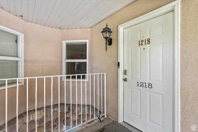 1218 W 1420 N, Orem, UT 84057 - entrance to property with stucco siding and a porch