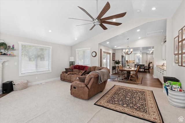 5719 W Boulder Creek Rd, West Jordan, UT 84081 - living room featuring vaulted ceiling, a chandelier, ceiling fan, recessed lighting, and carpet floors