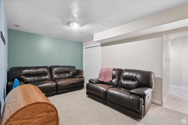 5719 W Boulder Creek Rd, West Jordan, UT 84081 - living room featuring carpet flooring and a textured ceiling