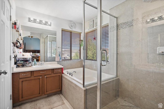 5719 W Boulder Creek Rd, West Jordan, UT 84081 - bathroom featuring a stall shower, vanity, and a bath