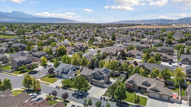 5719 W Boulder Creek Rd, West Jordan, UT 84081 - aerial overview of property's location featuring a mountain backdrop and nearby suburban area