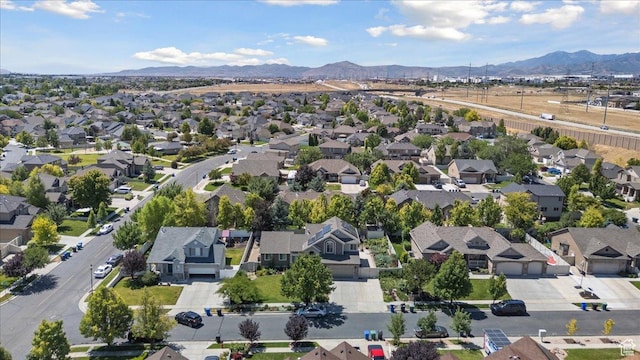 5719 W Boulder Creek Rd, West Jordan, UT 84081 - aerial perspective of suburban area with a mountainous background