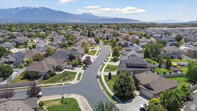 5719 W Boulder Creek Rd, West Jordan, UT 84081 - aerial overview of property's location featuring nearby suburban area and a mountain backdrop