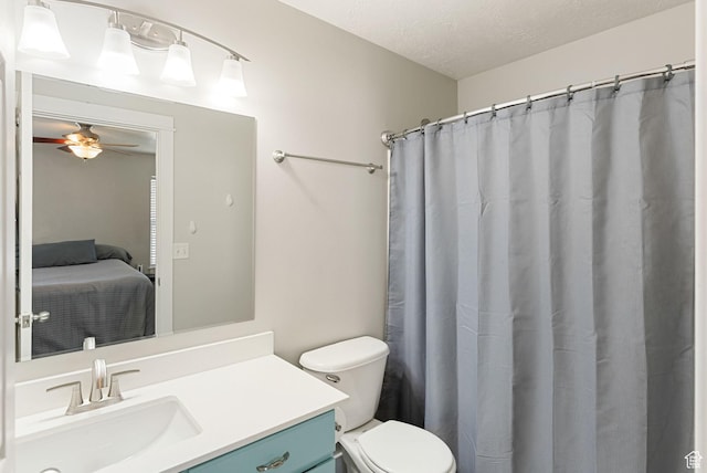 151 E 360 N, Providence, UT 84332 - ensuite bathroom with vanity, a ceiling fan, a textured ceiling, and curtained shower