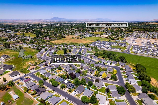 151 E 360 N, Providence, UT 84332 - aerial view of property and surrounding area with a mountainous background