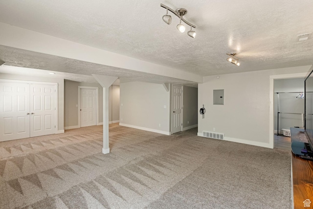 151 E 360 N, Providence, UT 84332 - finished below grade area featuring electric panel, a textured ceiling, carpet flooring, and track lighting
