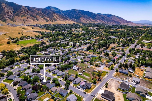 151 E 360 N, Providence, UT 84332 - aerial view of property's location with a mountain backdrop