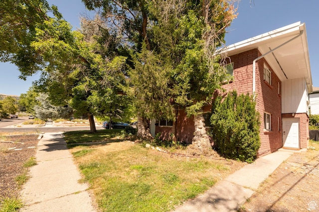 906 E Third Ave, Salt Lake City, UT 84103 - view of home's exterior featuring brick siding