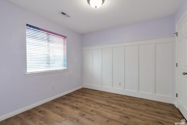 901 S Apple Grove Ln, Pleasant Grove, UT 84062 - unfurnished bedroom featuring wood finished floors and baseboards