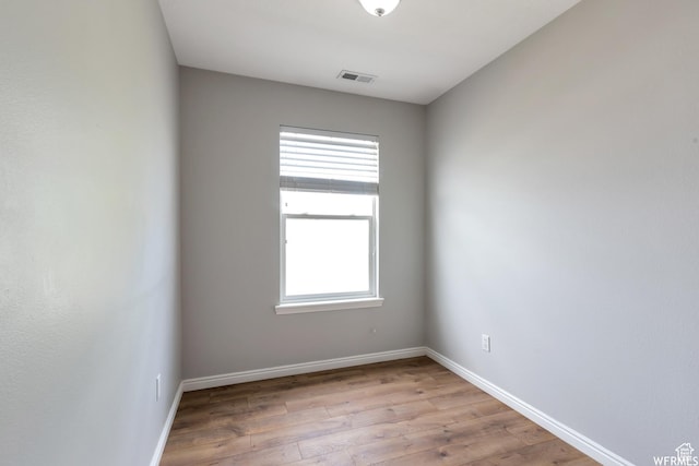 901 S Apple Grove Ln, Pleasant Grove, UT 84062 - unfurnished room featuring light wood-type flooring and healthy amount of natural light