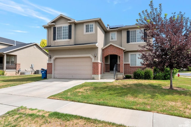 901 S Apple Grove Ln, Pleasant Grove, UT 84062 - traditional home featuring stucco siding, solar panels, and a front yard