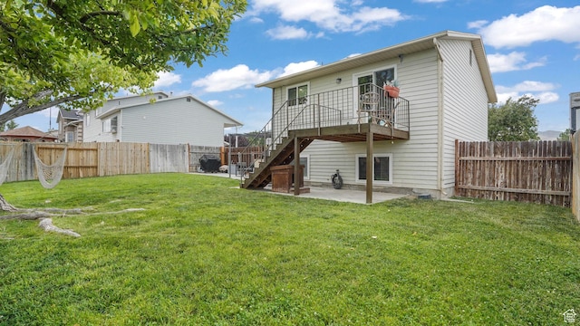 3737 S Washington Dr W, Magna, UT 84044 - back of house with a fenced backyard, stairway, and a patio area