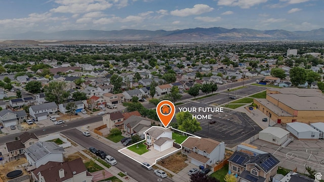 3737 S Washington Dr W, Magna, UT 84044 - aerial perspective of suburban area with a mountainous background