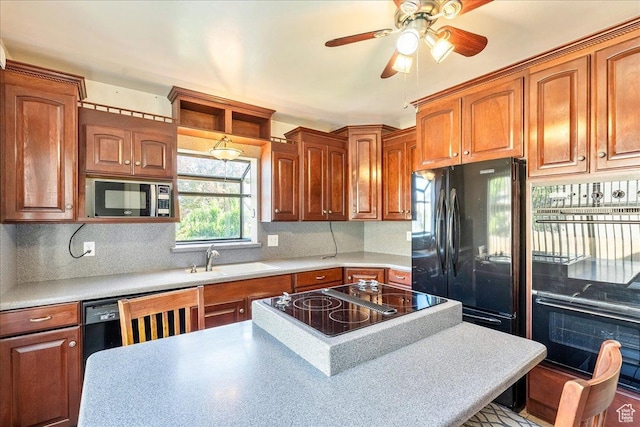 458 E 8800 S, Sandy, UT 84070 - kitchen with black appliances, ceiling fan, light countertops, and backsplash