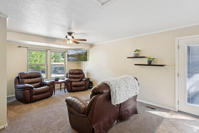 2999 N 300 E, North Ogden, UT 84414 - living room with ceiling fan, ornamental molding, a textured ceiling, and carpet flooring