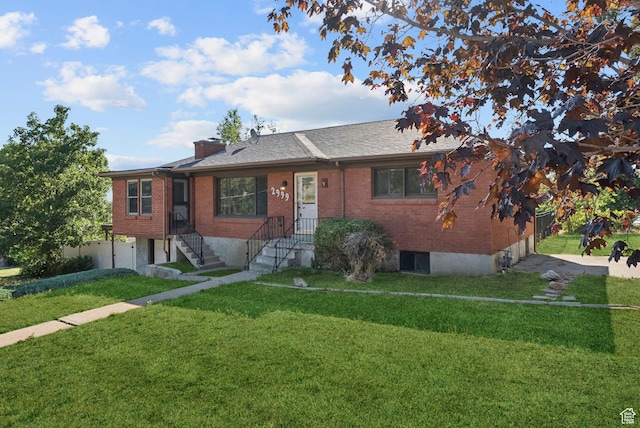 2999 N 300 E, North Ogden, UT 84414 - view of front facade featuring brick siding, a chimney, and an attached garage