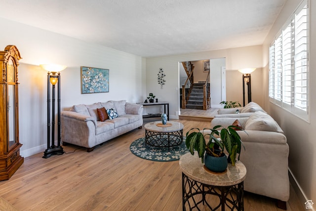 2148 E Pinecrest Ln S, Sandy, UT 84092 - living room featuring stairs and wood finished floors