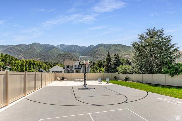 2148 E Pinecrest Ln S, Sandy, UT 84092 - view of basketball court featuring a mountain view, basketball court, and a fenced backyard