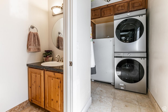 2148 E Pinecrest Ln S, Sandy, UT 84092 - laundry room with stacked washer / dryer and a sink