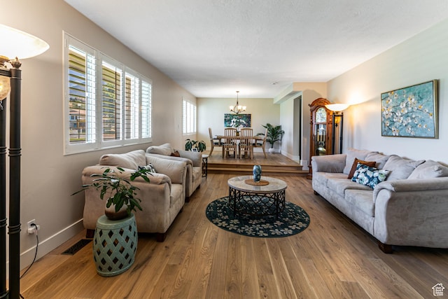 2148 E Pinecrest Ln S, Sandy, UT 84092 - living room with a chandelier and wood finished floors