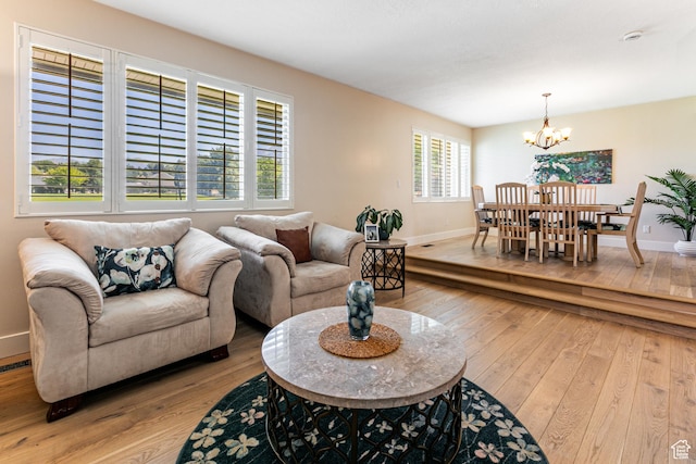 2148 E Pinecrest Ln S, Sandy, UT 84092 - living area with light wood-style floors and a chandelier