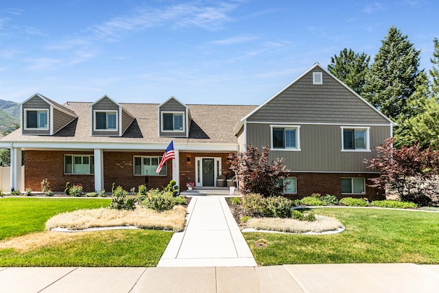 2148 E Pinecrest Ln S, Sandy, UT 84092 - view of front of home featuring brick siding and a front lawn