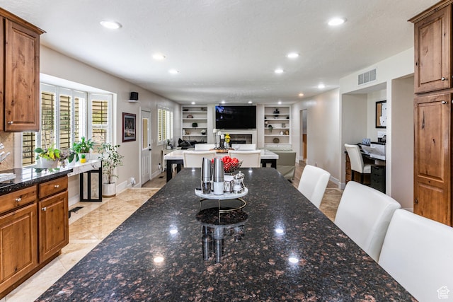 2148 E Pinecrest Ln S, Sandy, UT 84092 - dining space with recessed lighting, built in features, and a fireplace