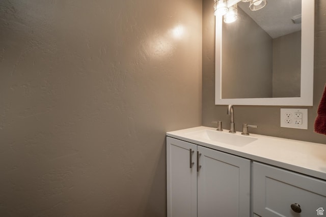 3378 N Sr 87 W, Talmage, UT 84073 - bathroom featuring vanity and a textured wall