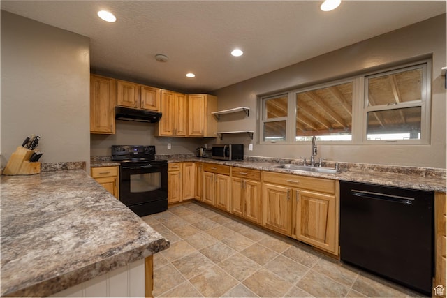 3378 N Sr 87 W, Talmage, UT 84073 - kitchen with black appliances, under cabinet range hood, recessed lighting, and light stone finish floors