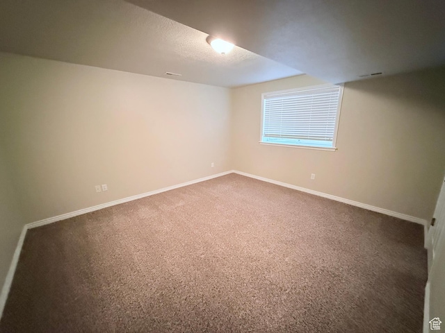 2205 N 600 E, North Ogden, UT 84414 - unfurnished room featuring carpet flooring and a textured ceiling
