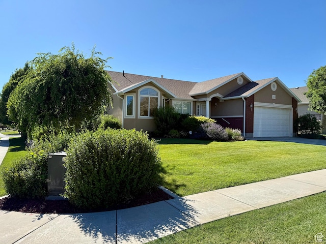 2205 N 600 E, North Ogden, UT 84414 - ranch-style home featuring a front lawn, an attached garage, and driveway