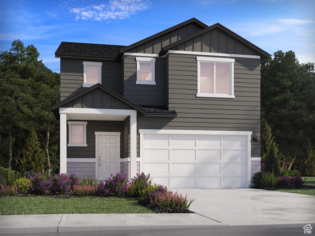 3508 N Gina Unit 1201, Eagle Mountain, UT 84005 - view of front of home featuring an attached garage, board and batten siding, and driveway
