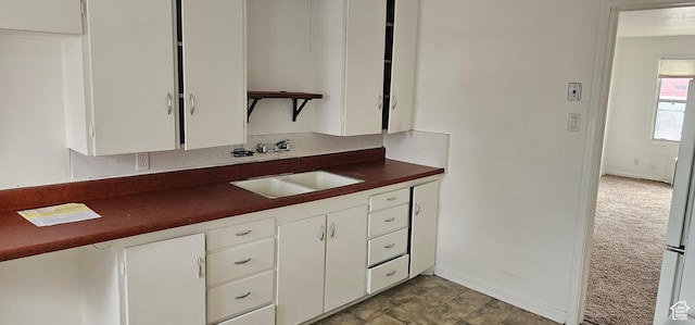 40 W 400 N Unit 1-6, Spanish Fork, UT 84660 - kitchen featuring dark countertops, white cabinets, and carpet flooring
