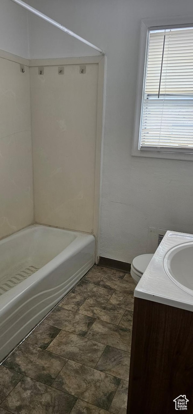 40 W 400 N Unit 1-6, Spanish Fork, UT 84660 - bathroom with vanity, stone finish flooring, and shower / bath combination