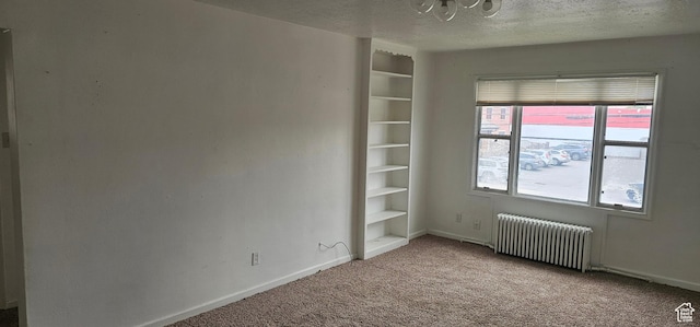40 W 400 N Unit 1-6, Spanish Fork, UT 84660 - carpeted spare room featuring radiator, a textured ceiling, and a chandelier